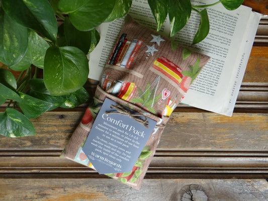 Comfort Pack Heating Pad, Houseplants and Books