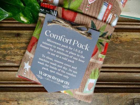 Comfort Pack Heating Pad, Houseplants and Books